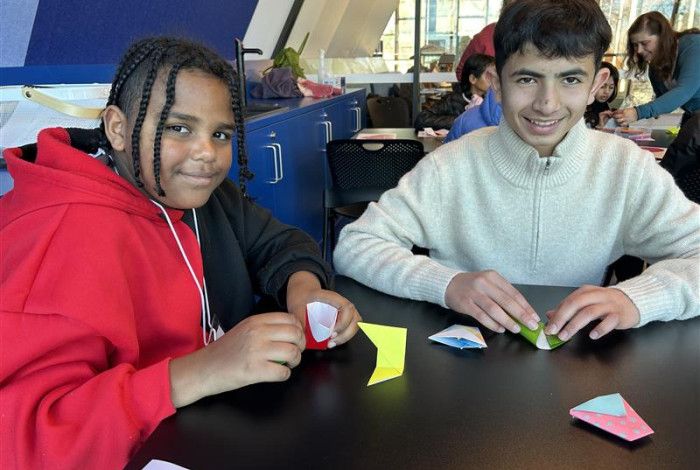 Image of two young people smiling