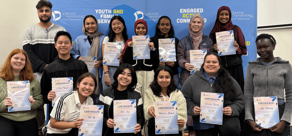 Young leaders posing with certificates