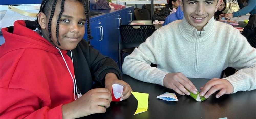 Image of two young people smiling