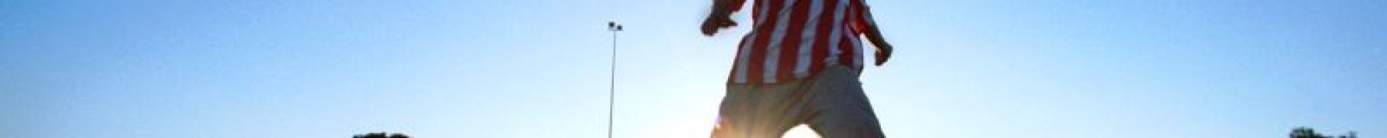 Youth playing soccer