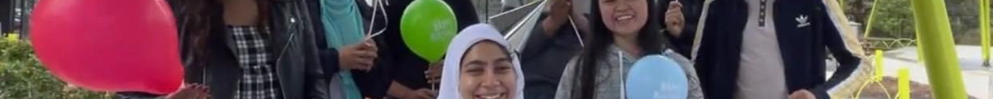 Group of young people having a COVID Safe birthday party