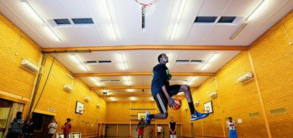 Youth playing basketball